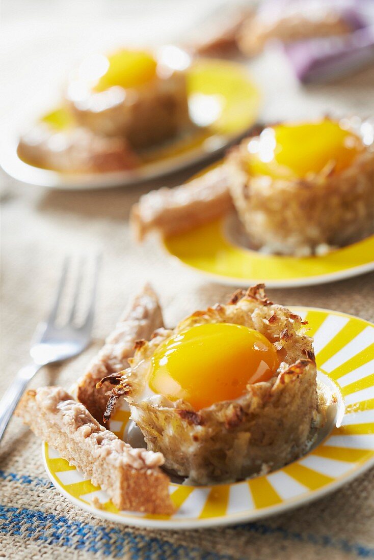 Coodled egg-style small Cherie potato nests and bread fingers with monkfish liver paté