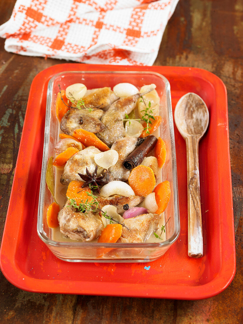 Quail, onions and carrots in spicy vinaigrette