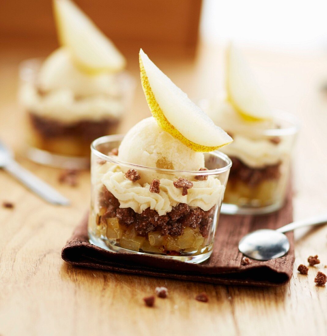 Stewed diced pear,crumbled chocolate corn flake cookie,whipped cream and pear sorbet desserts