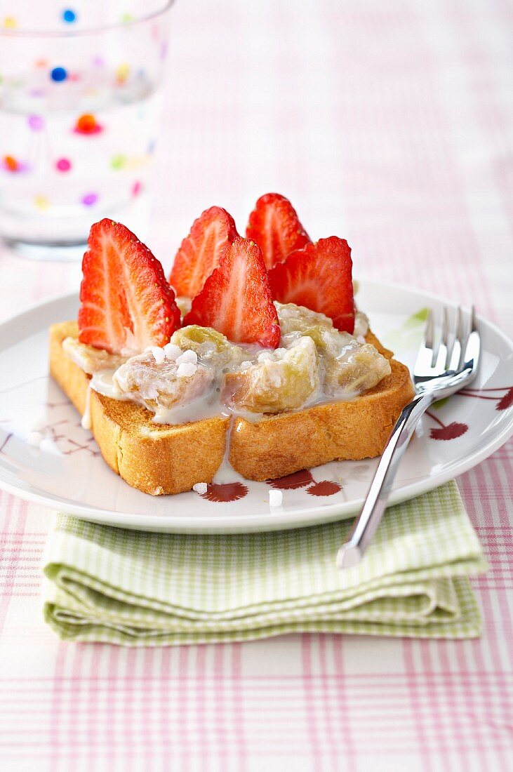 Rhubarb stewed with concentrated sweet milk and fresh strawberries on toasted brioche