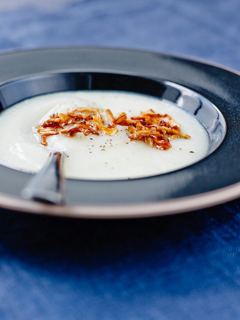 Cream of cauliflower and parsnip soup with chanterelles
