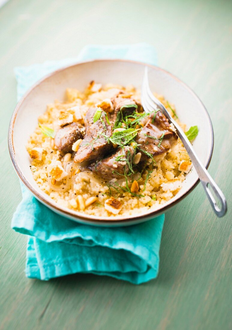 Lamb sauté and mashed artichokes and pine nuts