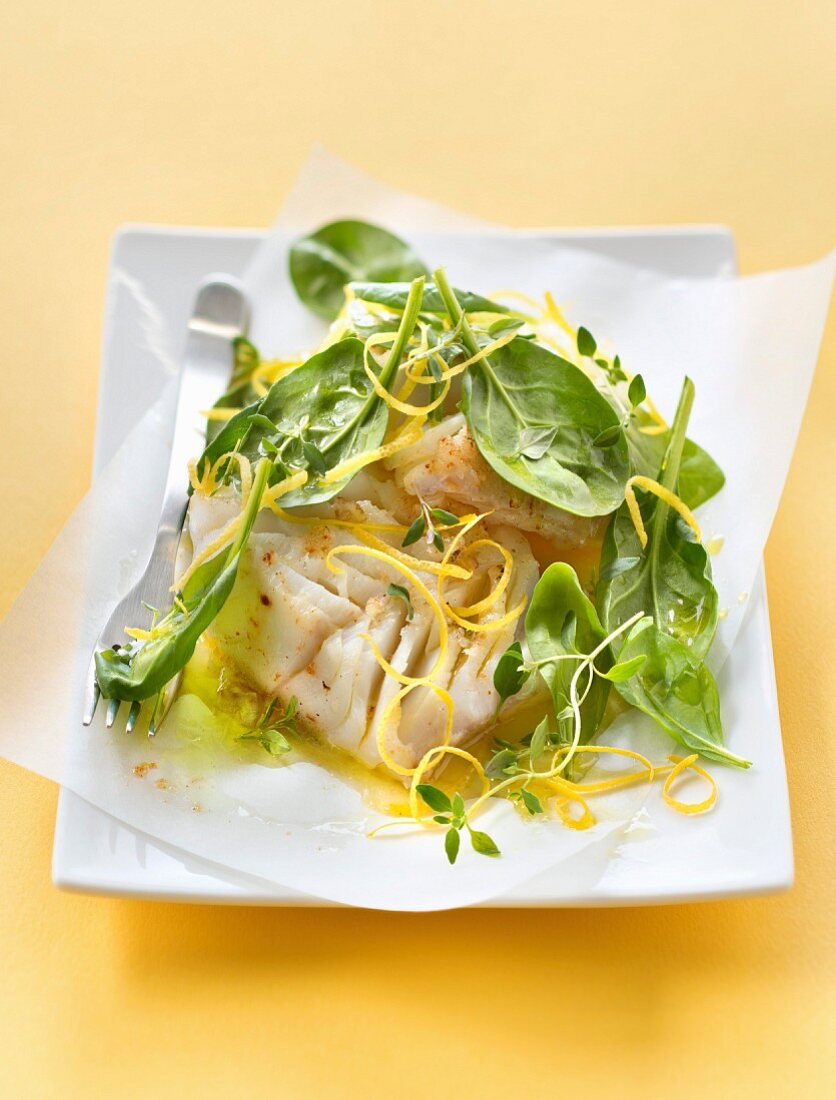 Cod with baby spinach and lemon zests