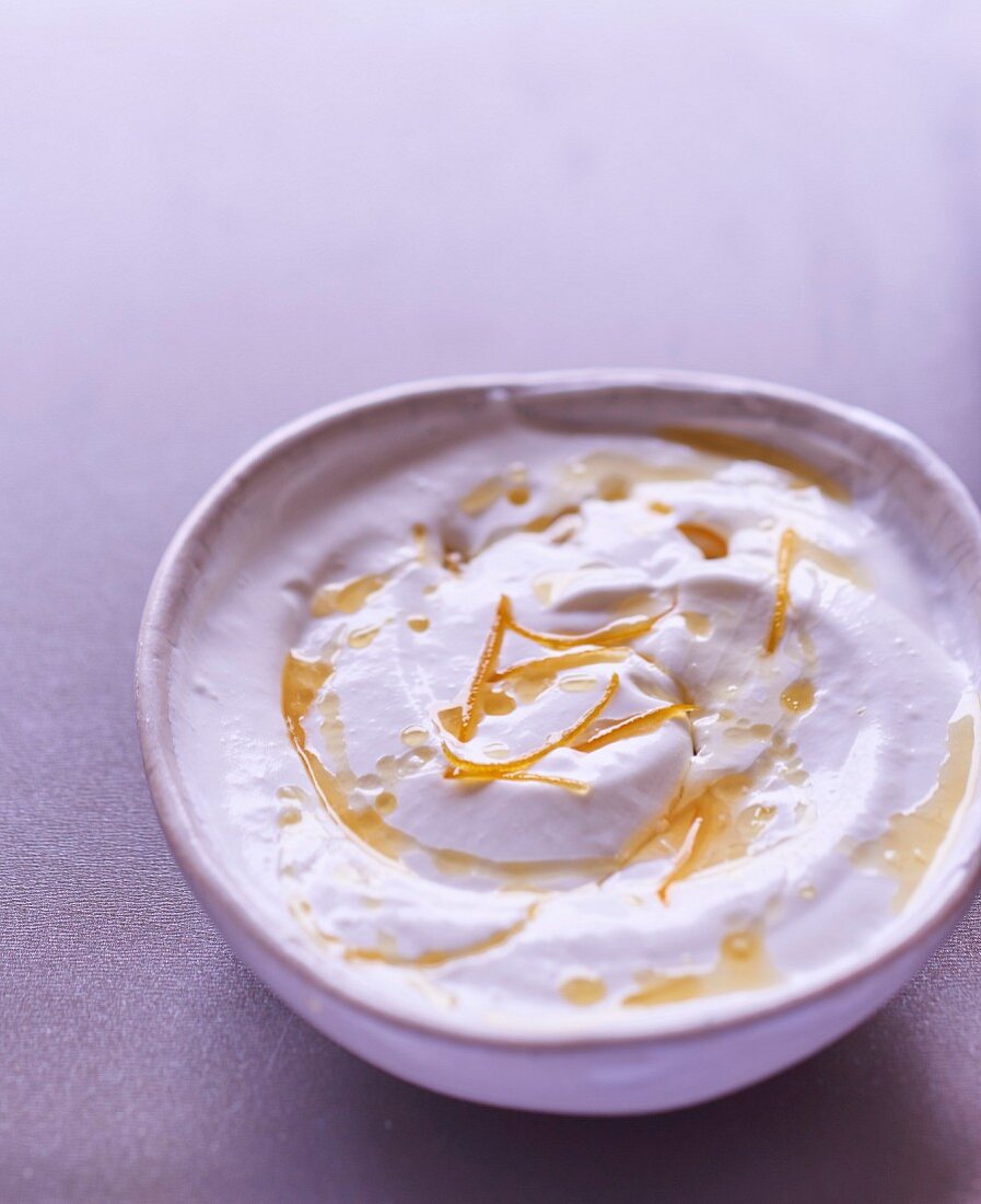 Whipped fromage blanc with honey and confit orange zests