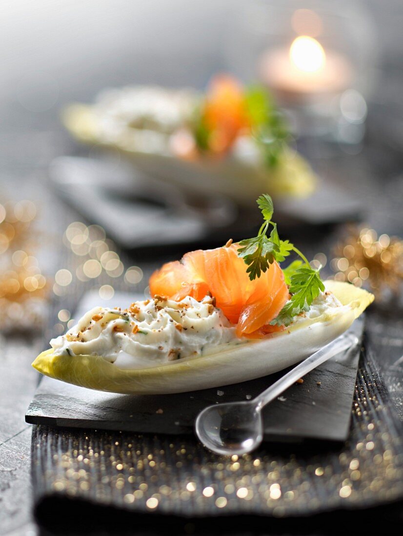 Crisp chicory leaves garnished with ricotta,dill and smoked salmon