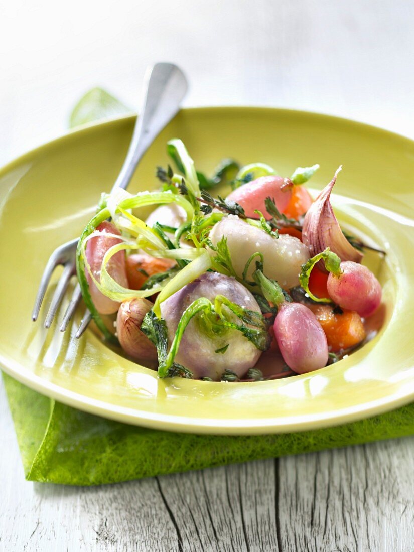 Vegetables with tops,pink garlic and thyme casserole