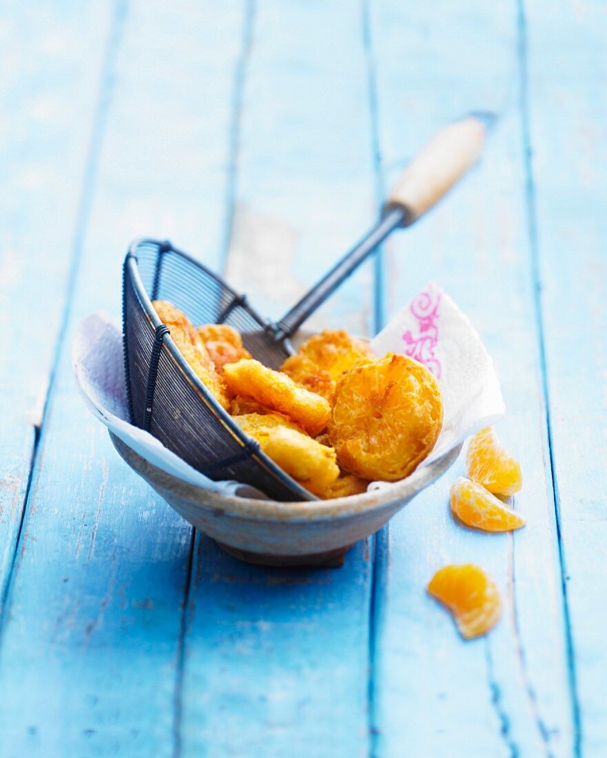 Rum-flavored clementine fritters