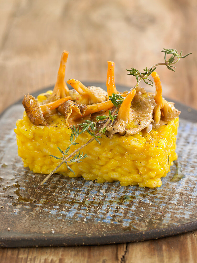 Pumpkin rice pudding topped with chanterelles