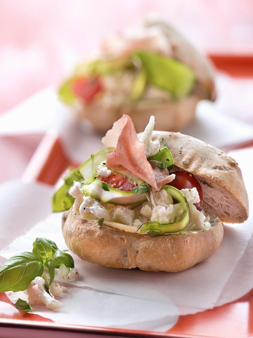 Cauliflower,cherry tomato,thinly sliced asparagus and raw ham sandwich bun