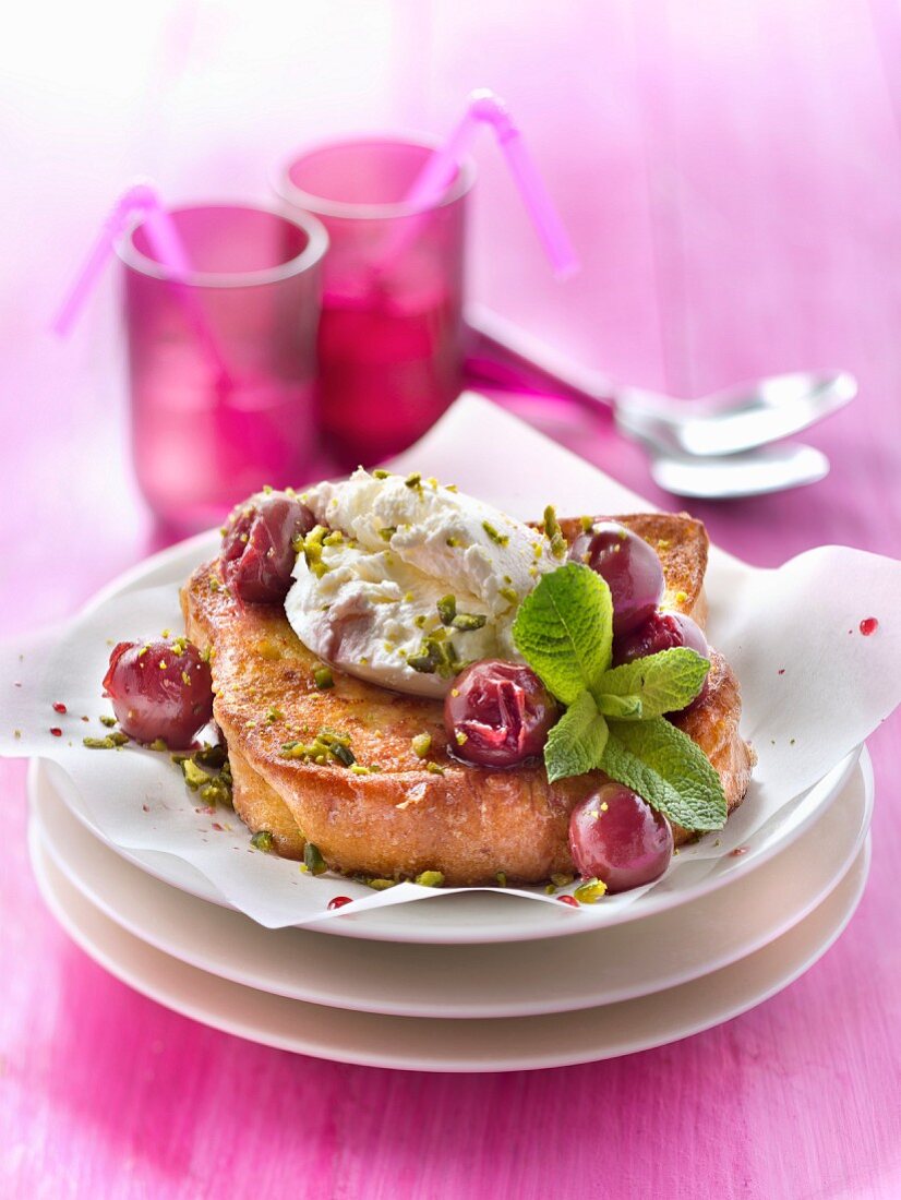 Brioche French toast with griotte sour cherries and pistachios