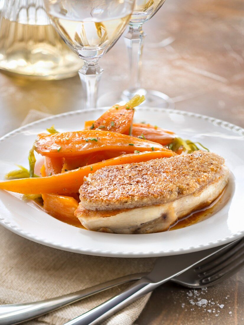 Chicken supreme in walnut crust and glazed carrots