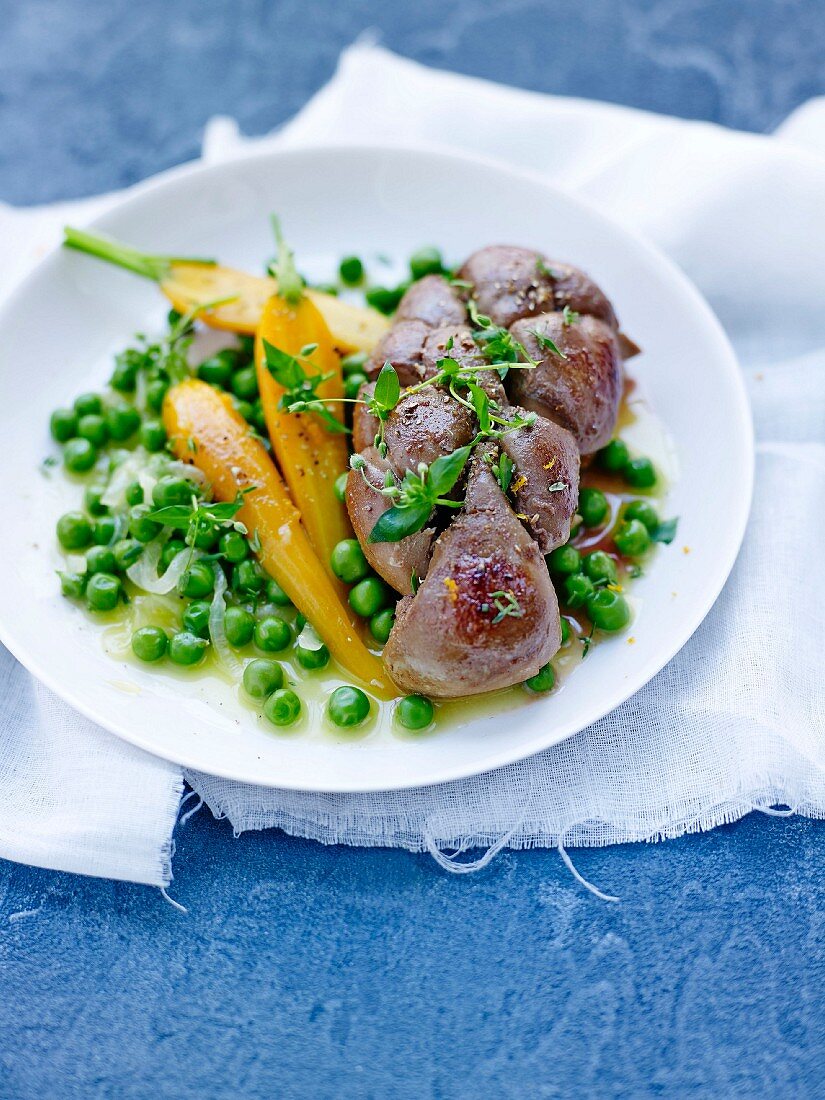 Veal's kidneys with peas,carrots and orange