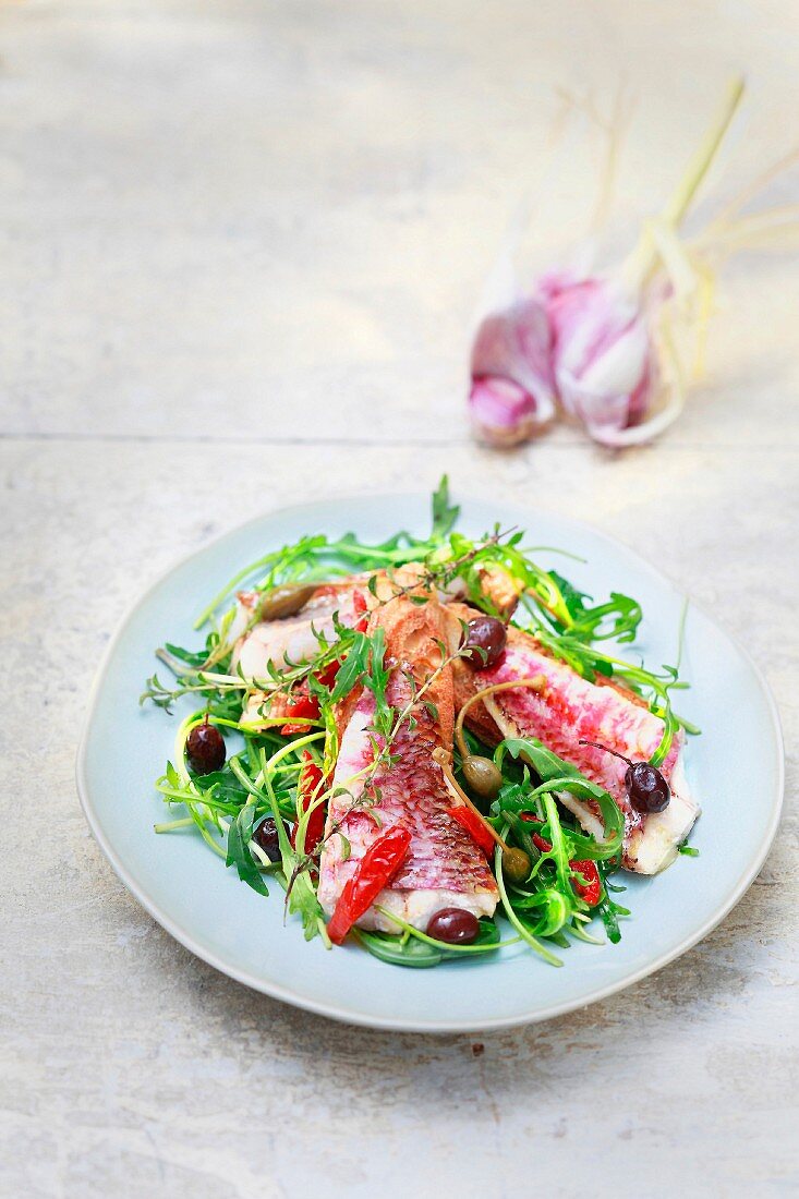 Warm red mullet,caper,olive and garlic salad