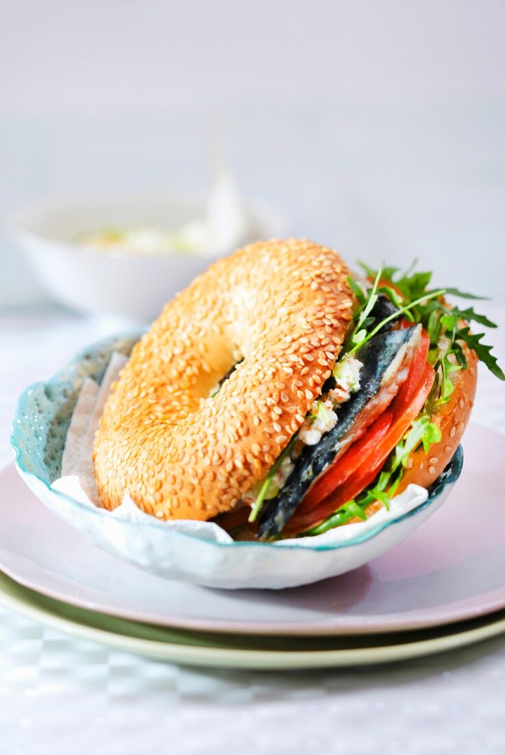 Lisette, tomato, rocket lettuce and cucumber Fromage blanc bagel sandwich