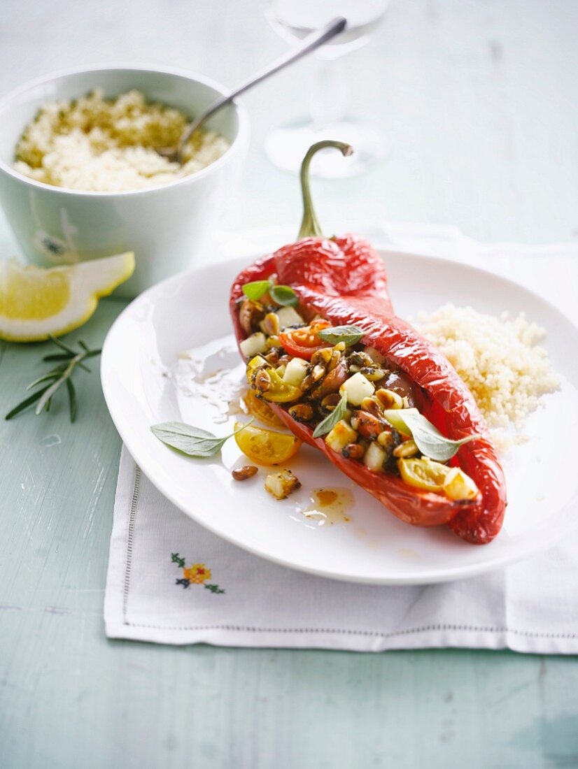 Red pepper stuffed with halloumi ,red and yellow cherry tomatoes and semolina