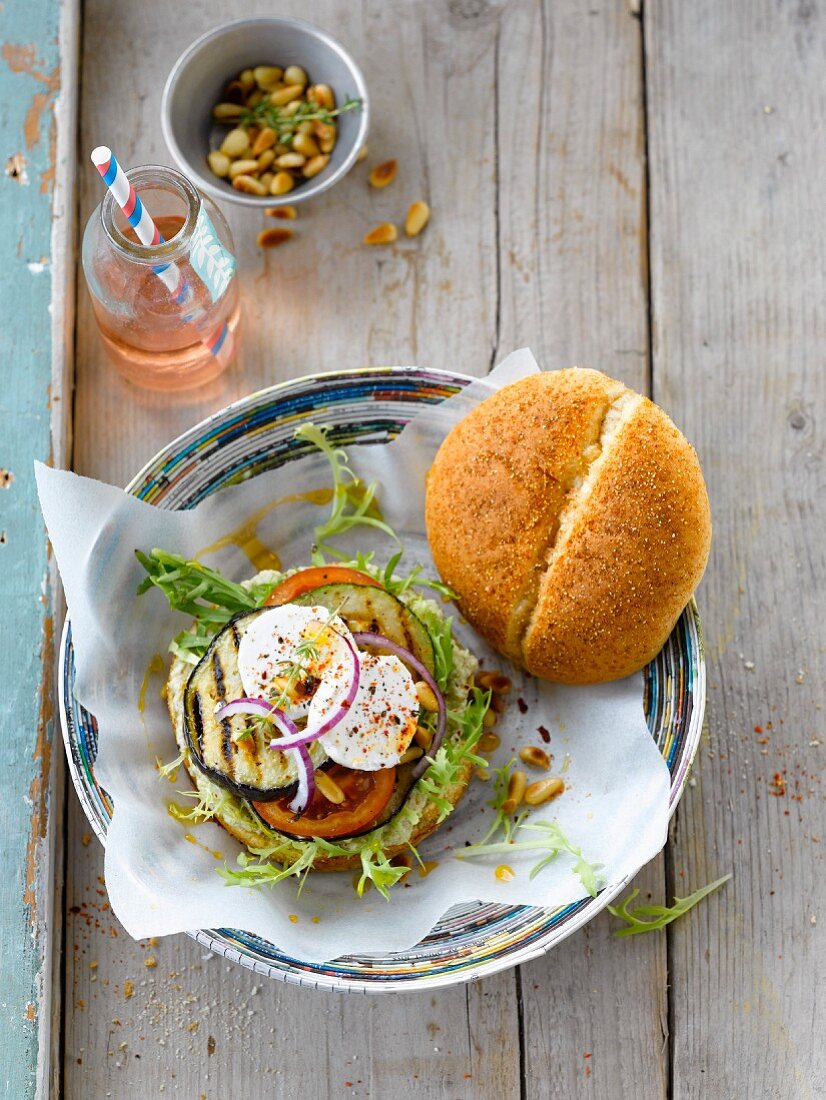 Vegetable burger with pine nuts and goat cheese