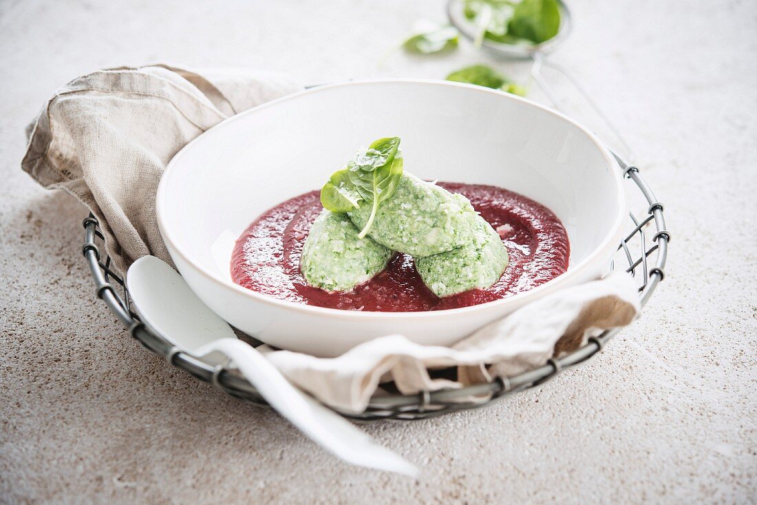 Cream of beetroot soup with spinach dumplings