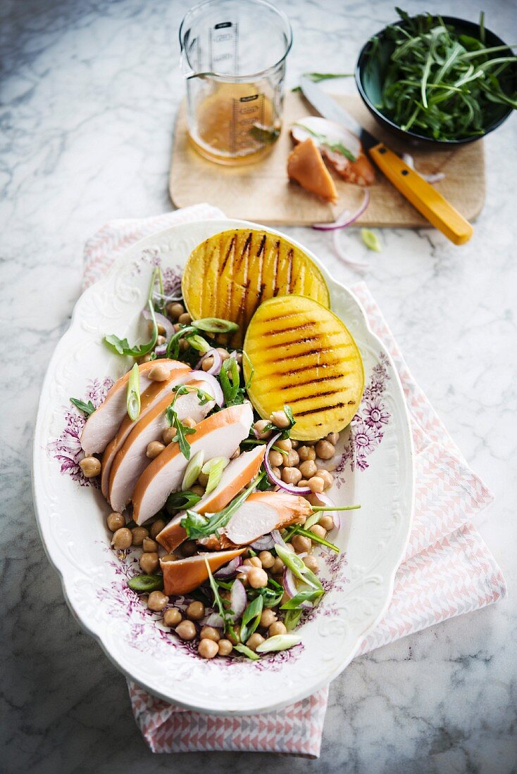 Smoked chicken breast, chickpeas salad and grilled mango