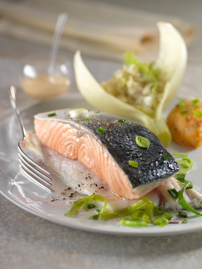 Sea bass duo and salmon,thinly sliced fennel and leeks