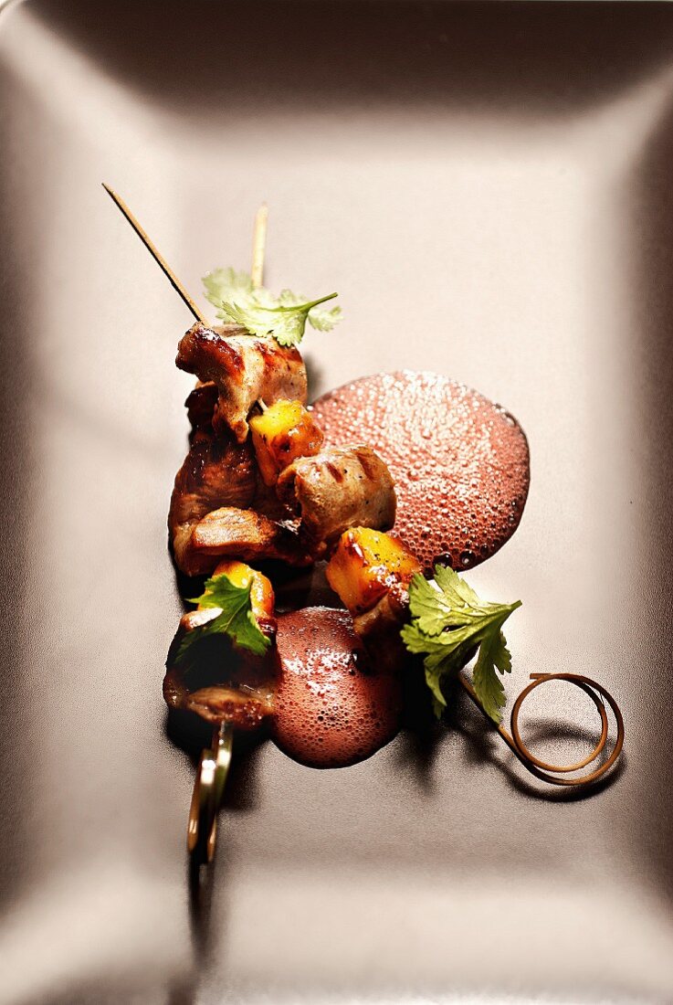 Meat and mango brochettes,summer fruit emulsion