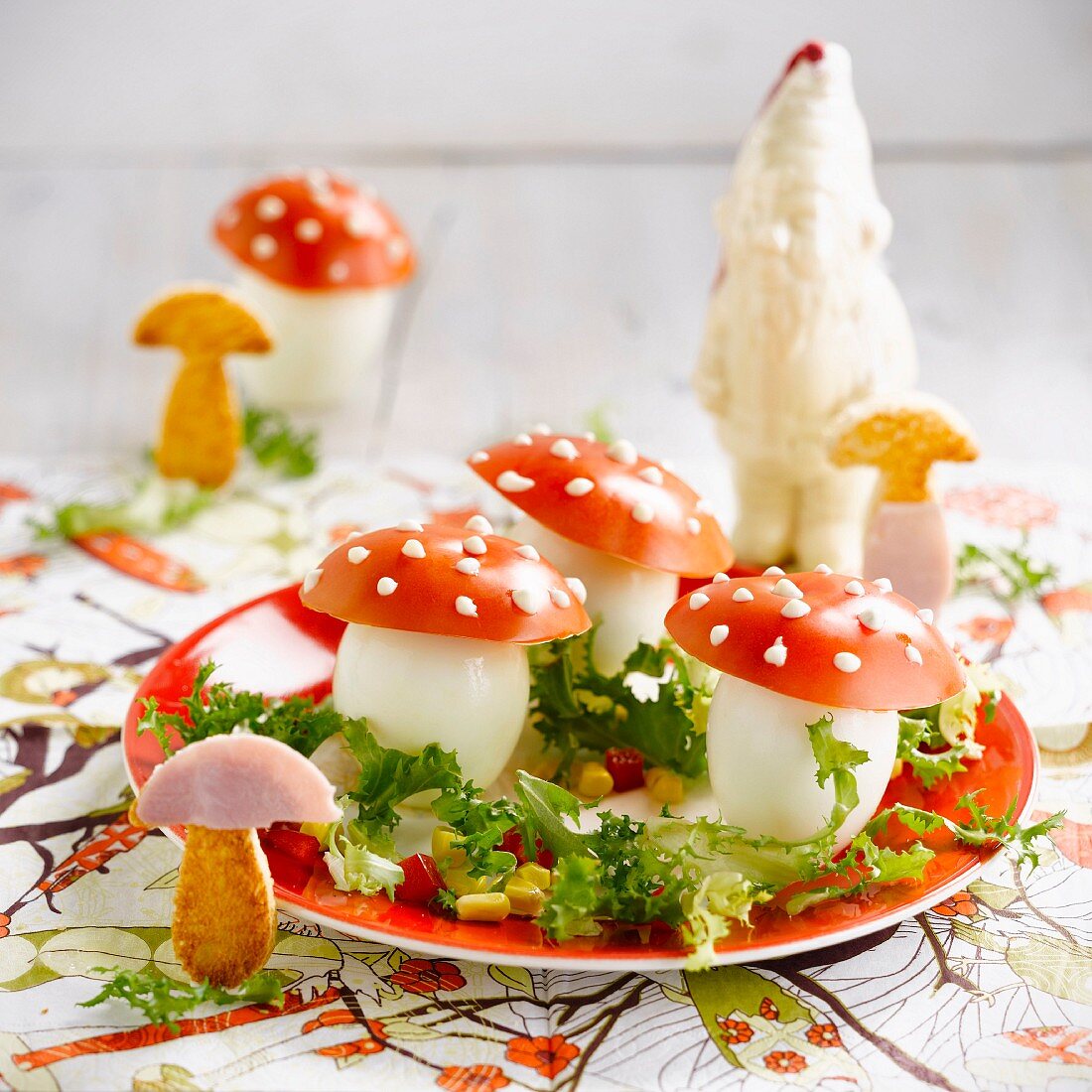Mushroom-shaped hard-boiled eggs and tomatoes
