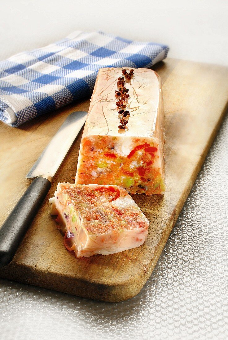 Fish, tomato, red bell pepper and Sechuan pepper terrine