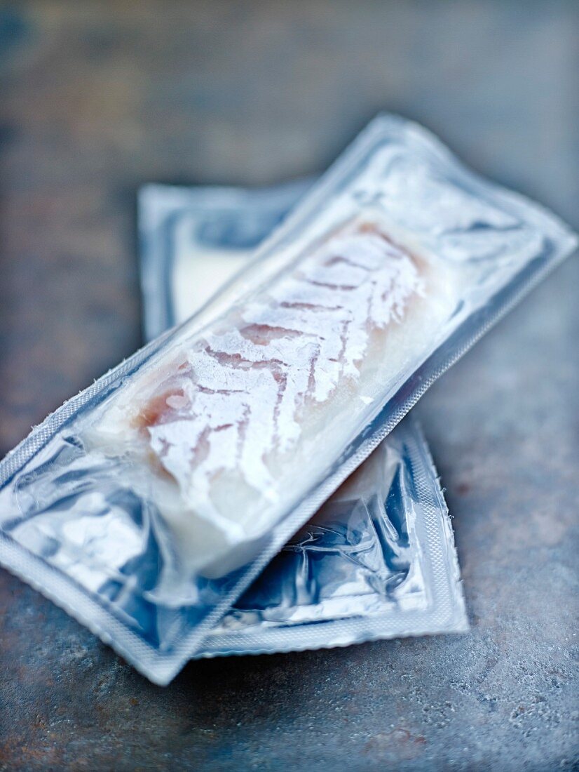 Vacuum-packed frozen white fish fillets