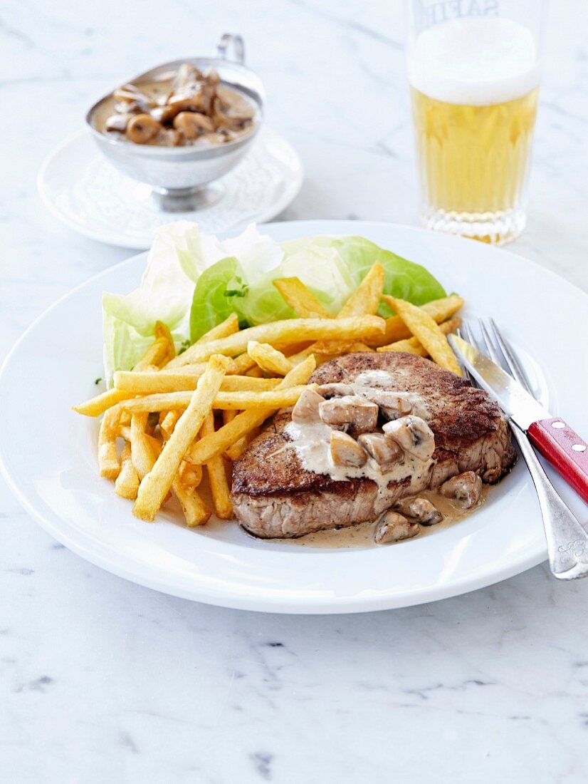 Steak and French fries,button mushroom sauce