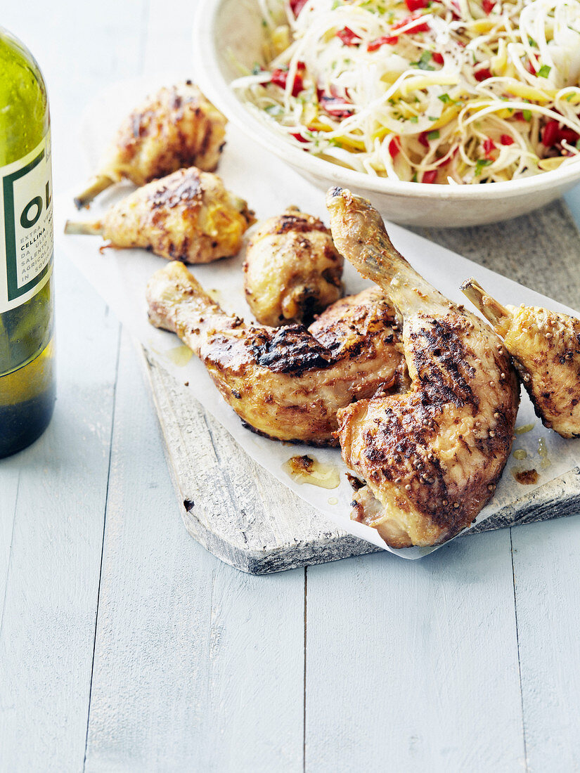Marinated and grilled chicken legs,white cabbage salad