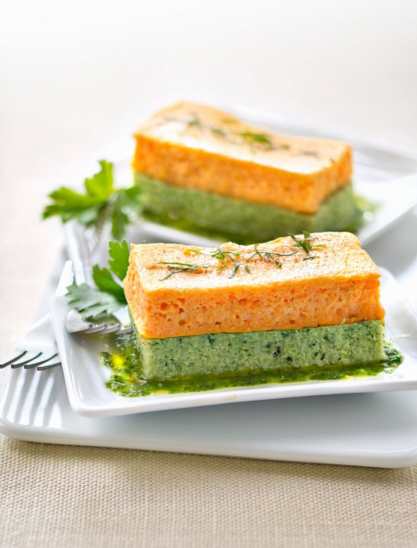 Mille-feuille of broccoli and carrot flans with parsley coulis