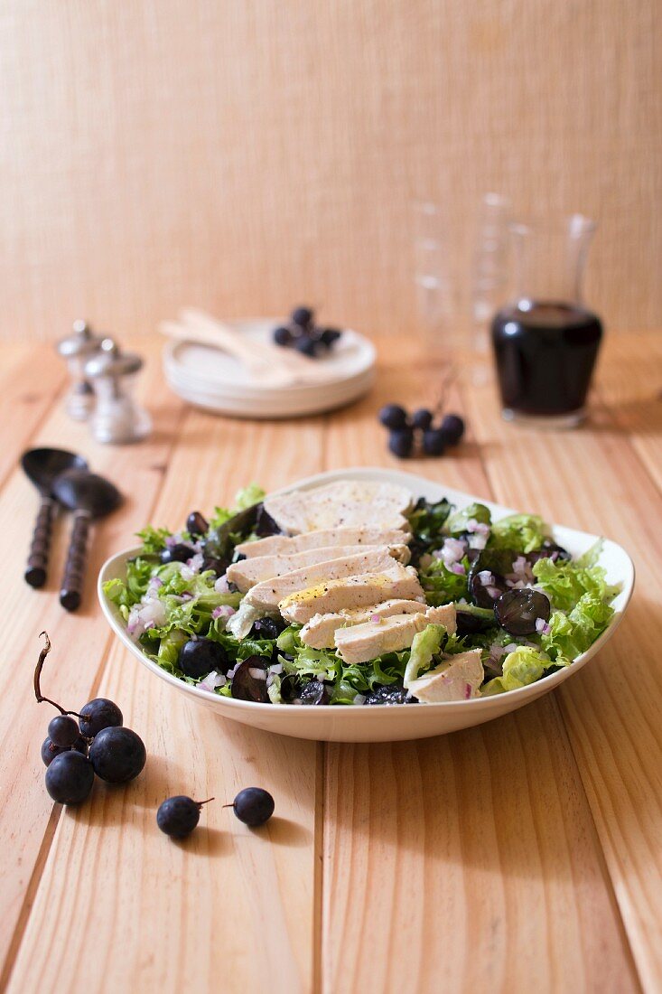 A salad of duck breast and black grapes
