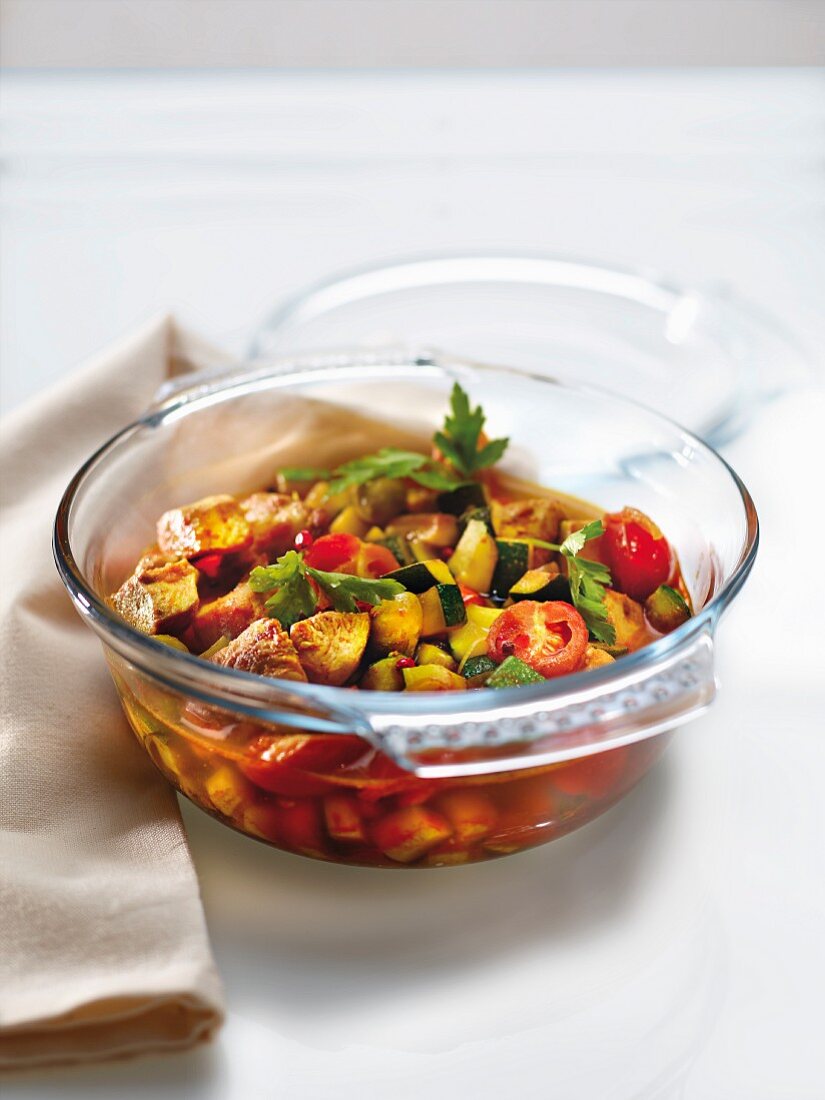 Spicy sauteed vegetables and thinly sliced chicken