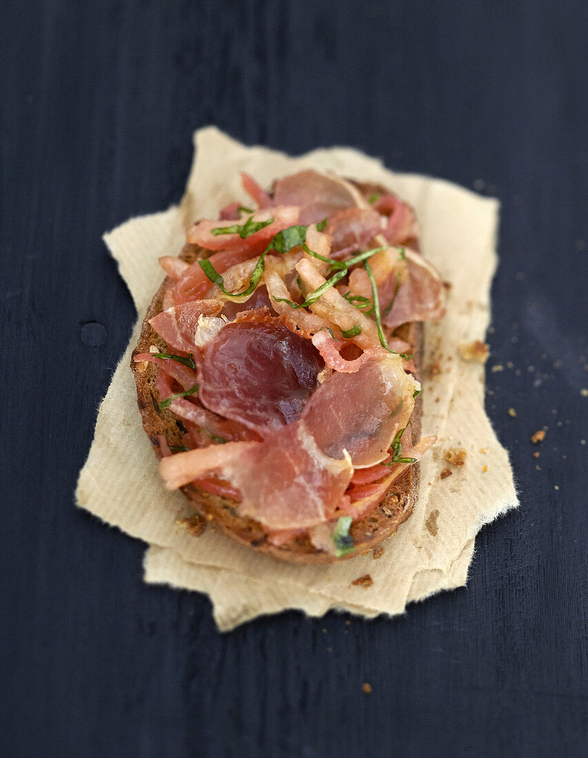 Raw ham and basil bruschetta