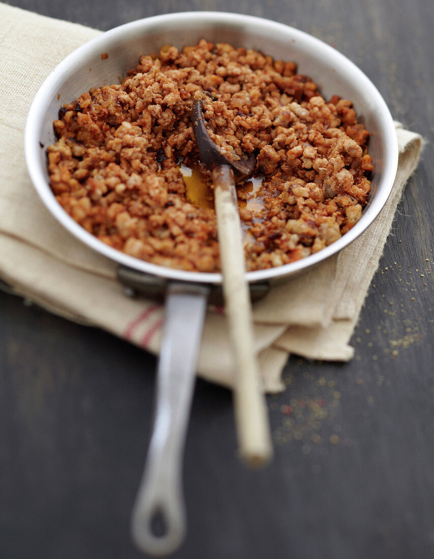 Preparing ground veal stuffing