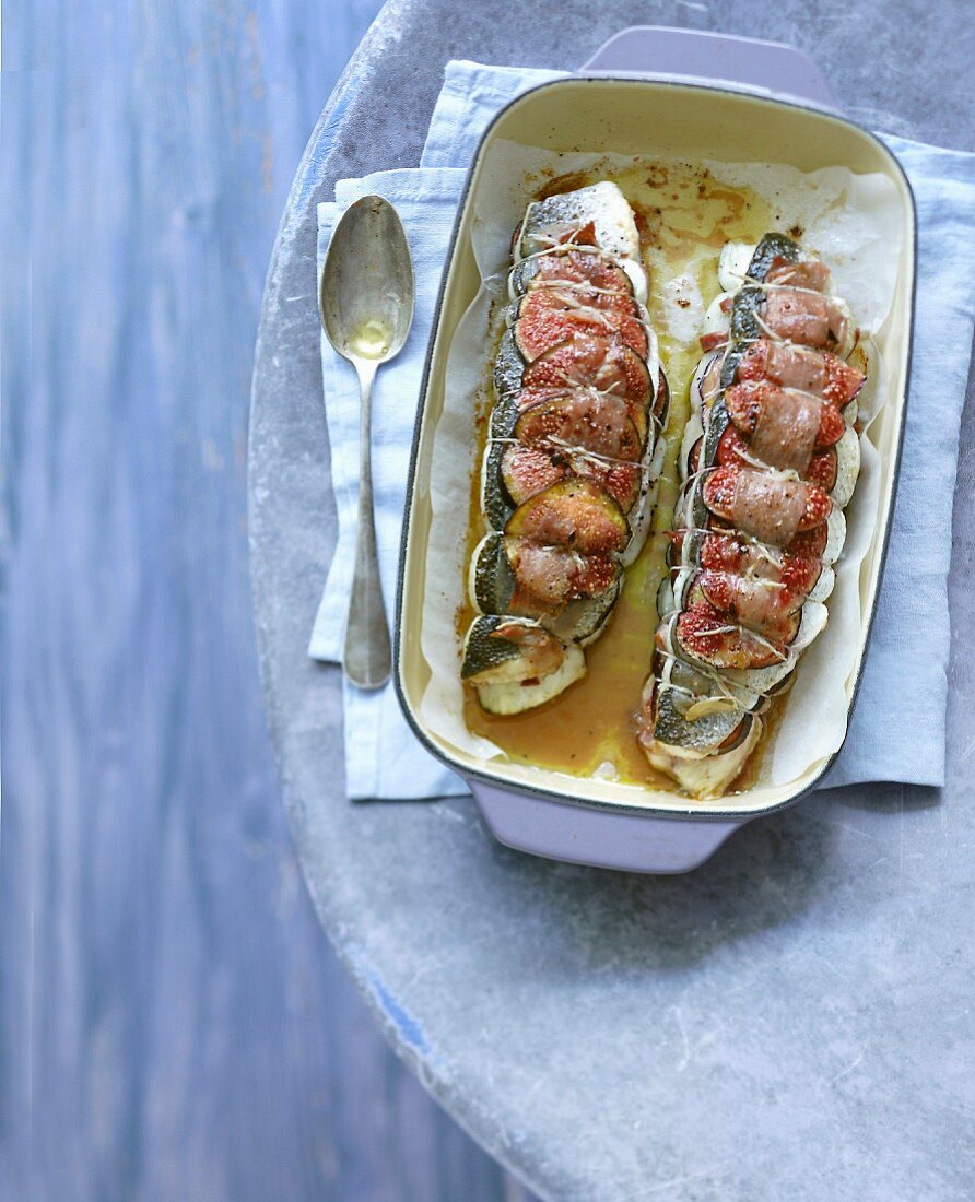Bass fillets roasted with Parma ham and figs