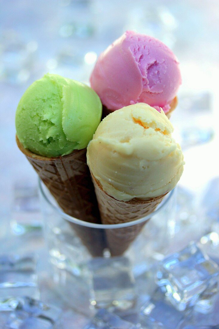 Three different flavored ice cream cones