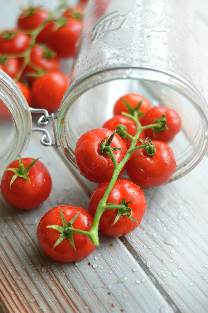 Bunch of tomatoes in a jar