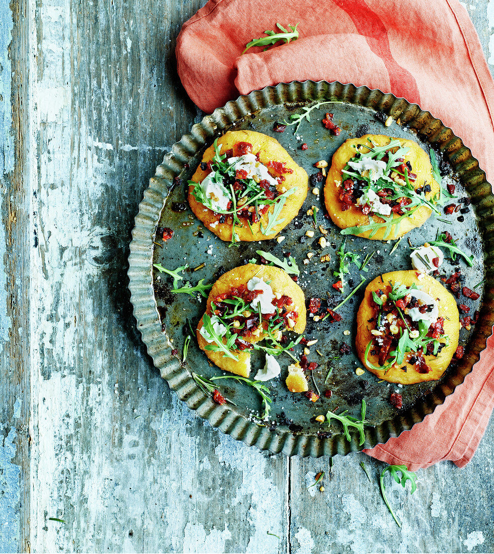 Mozzarella and thinly chopped chorizo spicy mini pizzas