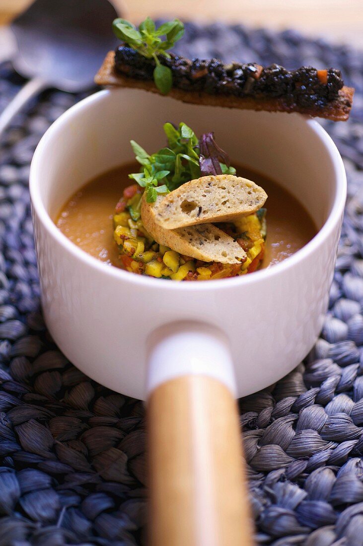 Summer vegetable tartare with gazpacho, tapenade finger bread