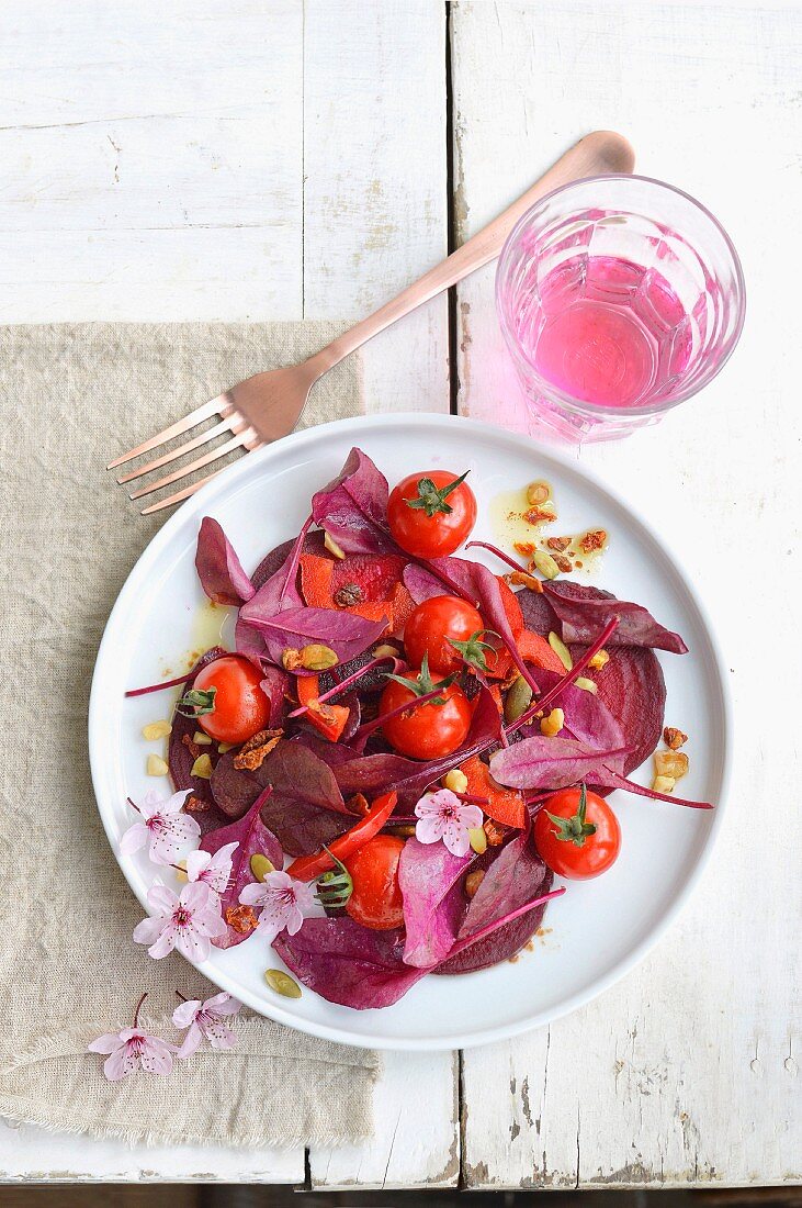 Baby beetroot leaves and cherry tomato salad