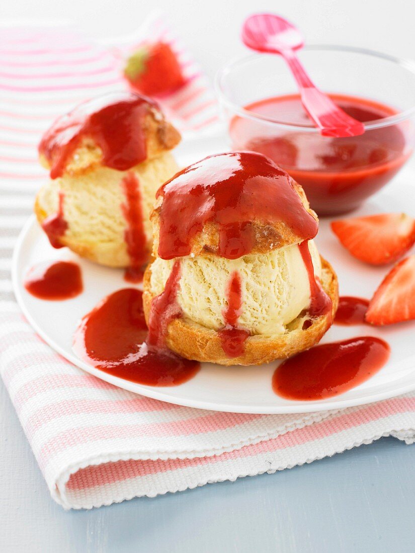 Profiteroles with strawberry coulis