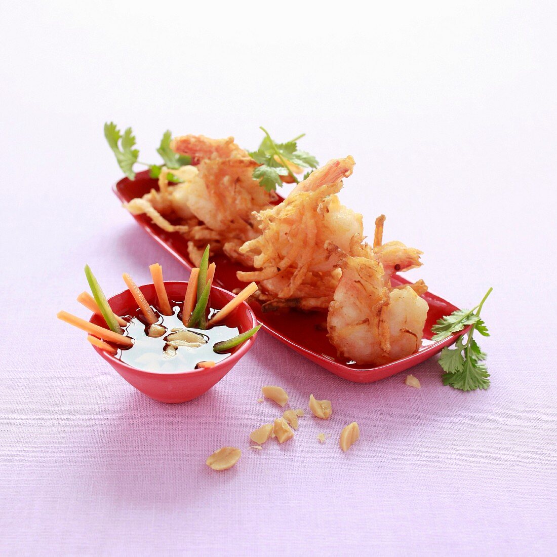 Shrimps in peanut and onion crust, vegetable sticks with vinaigrette