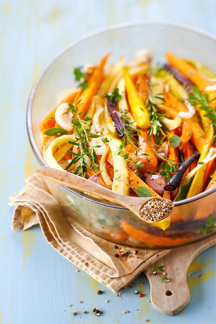 Old-fashioned carrot salad with fresh herbs and sesame seeds
