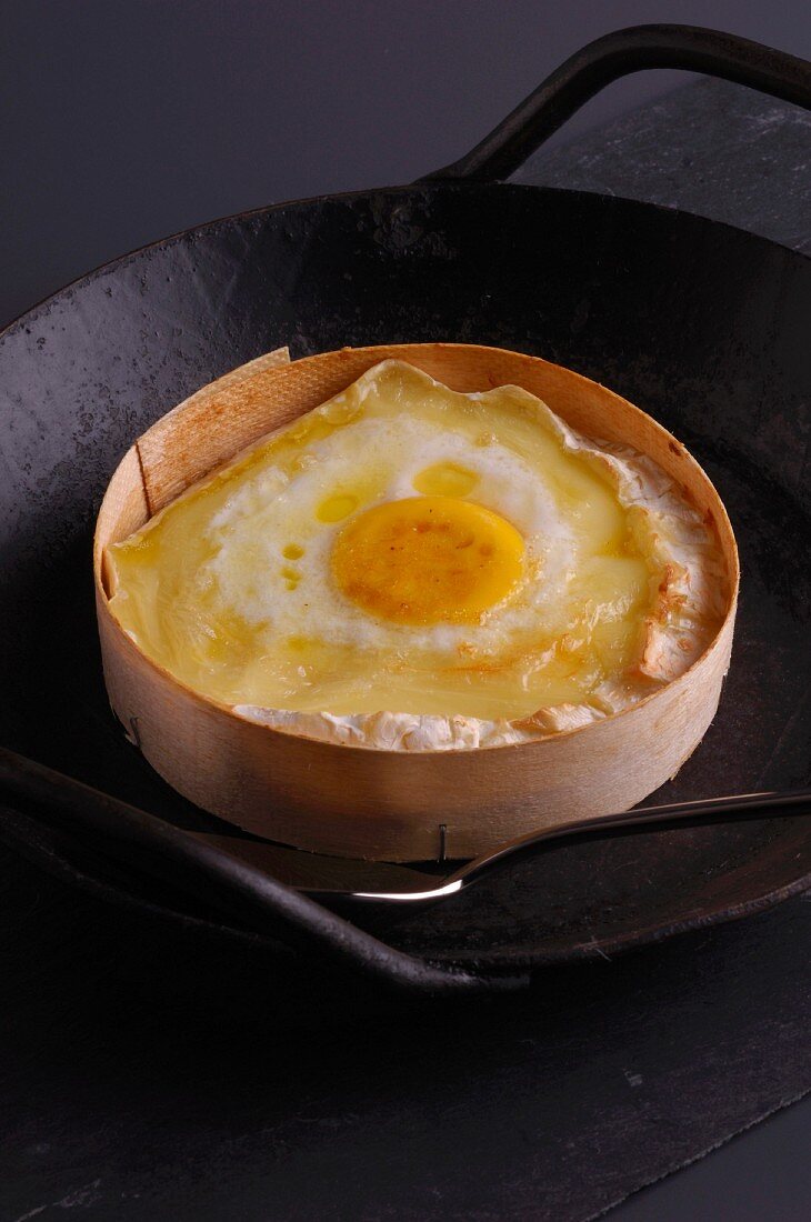 Camembert melted with an egg