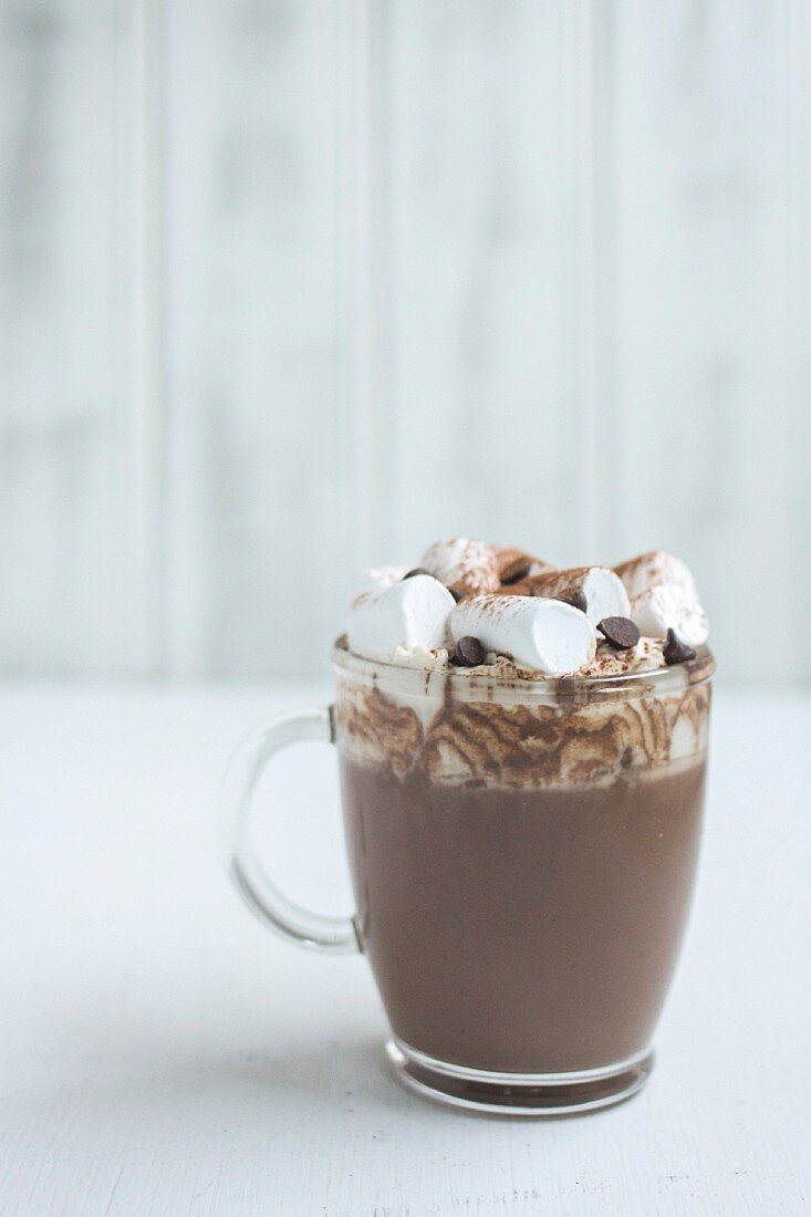 Cup of hot chocolate with marshmallows and chocolate chips