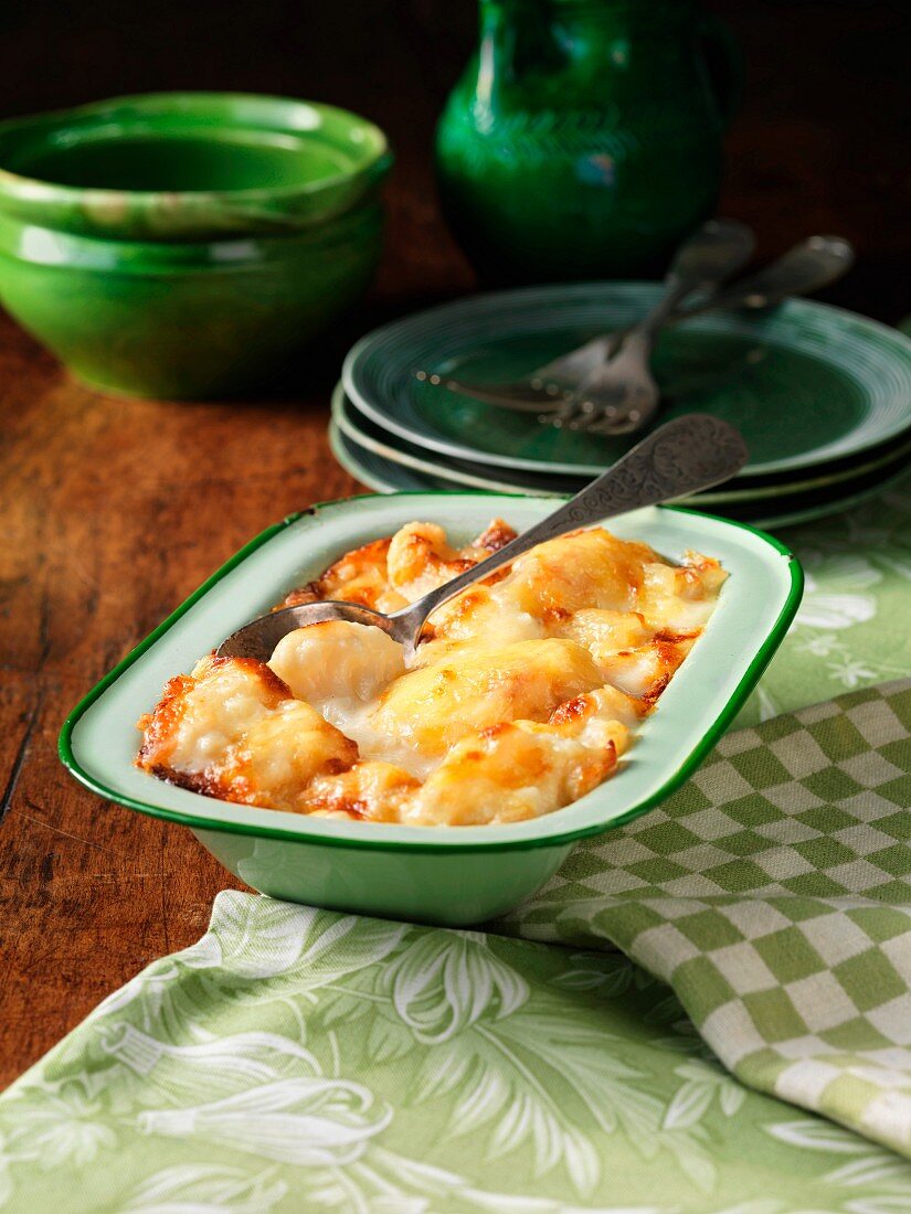 Cauliflower cheese in metal dish