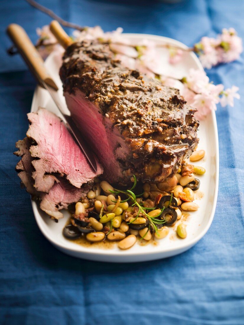 Leg of lamb with flageolets beans and black olives