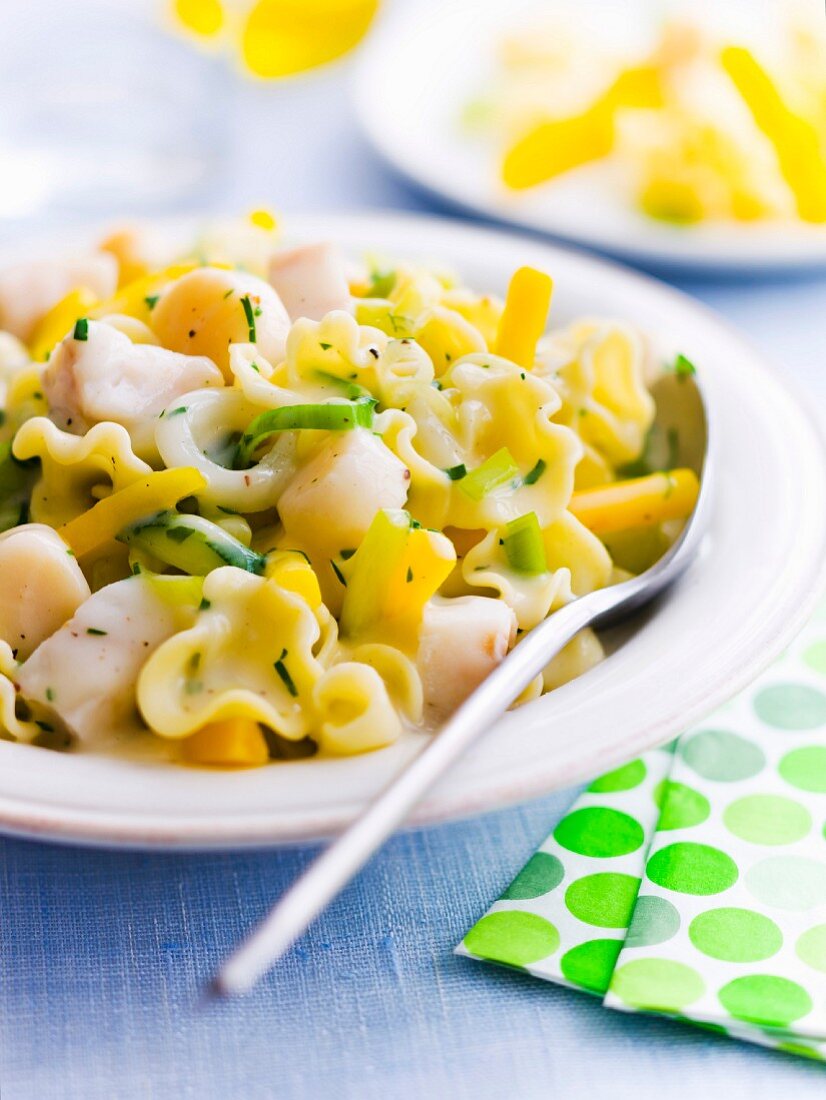 Hake and scallop duo, pasta and tender leeks