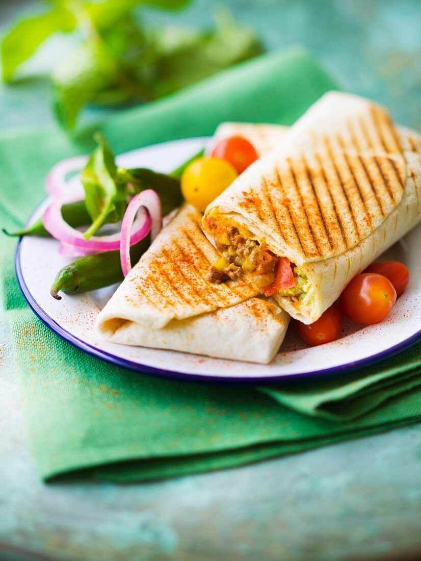 Ground beef, cheese and guacamole burritos