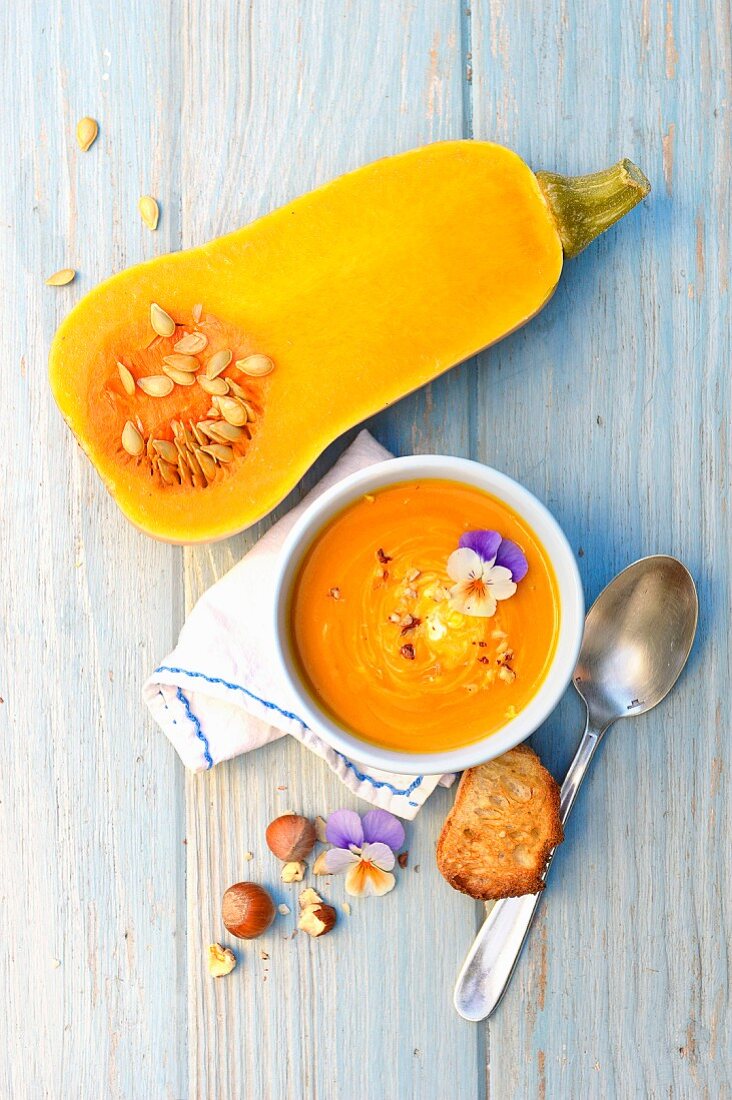 Butternut squash soup with crushed hazelnuts